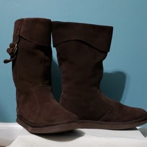 Brown pull-on boots with buckle detail